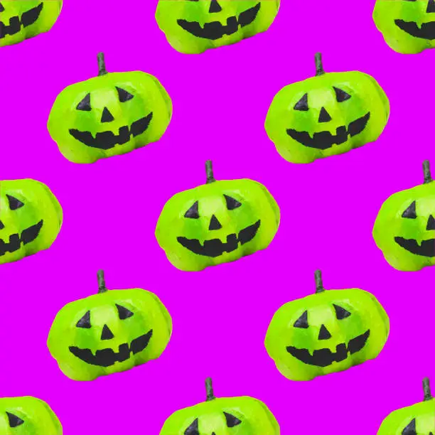 Photo of seamless pattern of green pumpkins on Halloween on purple background