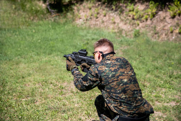 istock Military man at the Shooting Range 1169100656