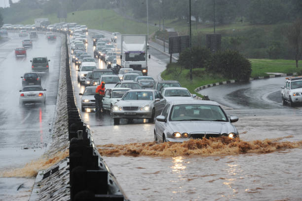 Cape Town, South Africa, 8 July 2012.  Motorists on the M3 highway in Rondenbosch had to drive through high water after during heavy rainfall.