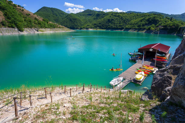 boat and canoe rentals on lake turano, italy. - tourist resort lake italy scenics imagens e fotografias de stock