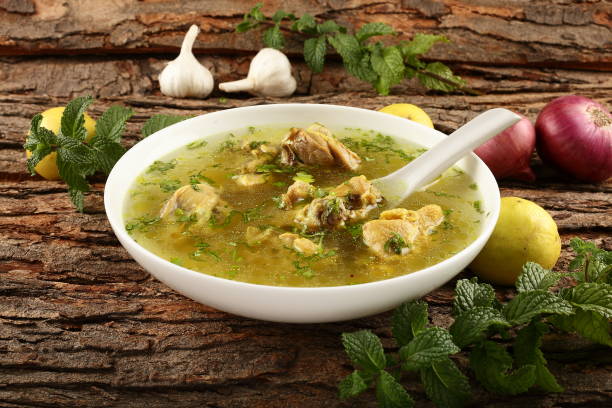 Healthy chicken soup Delicious homemade chicken clear soup cooked with organic herbs and spics. chicken soup stock pictures, royalty-free photos & images