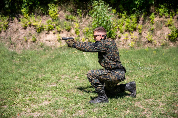 istock Military man at the Shooting Range 1169104276