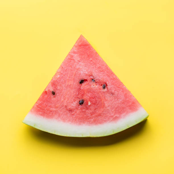 istock Watermelon sliced on yellow. Flat lay. Food concept. 1169105565