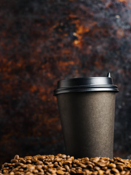 istock A Cup of coffee on a rusty old dark background with copyspace 1169105874