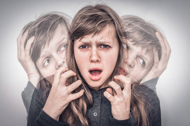 istock Woman with split personality suffers from schizophrenia 1169106941