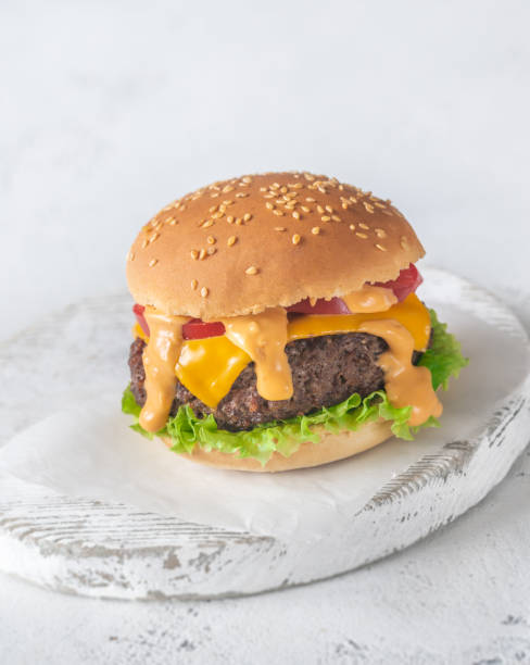 istock Hamburger on the wooden board 1169109193