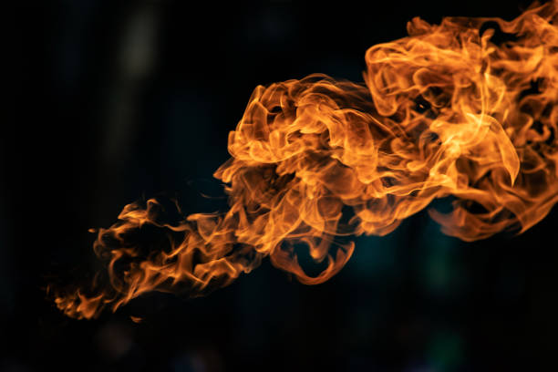 istock Closeup Fire flames from gas explosion on black background. 1169111802