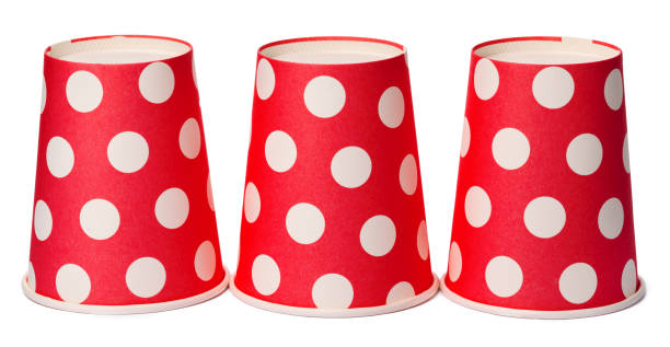 istock Group of cardboard disposable red dotted cups isolated 1169113485