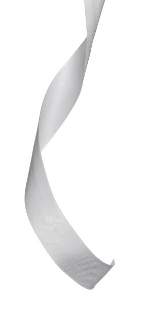 istock Vertical silver satin ribbon isolated on white background 1169118775
