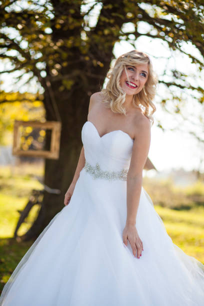 istock Happy bride in nature 1169119006
