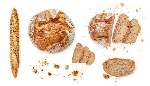istock Freshly baked bread isolated on white background. Rustic wholegrain bread, round shape 1169120592