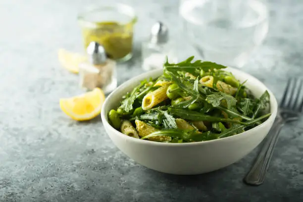 Pasta salad with pesto and arugula