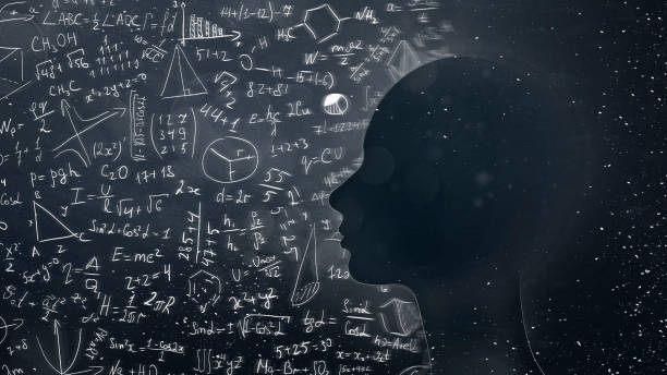 istock Female silhouette with physico-mathematical formulas and universe 1169124337