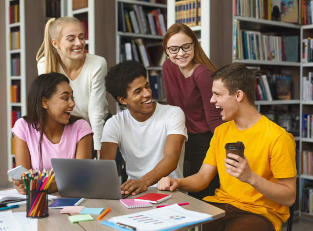 istock Enthusiastic teenager sharing his ideas with classmates 1169126528