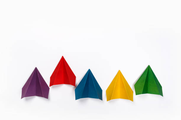 istock Color paper airplanes on white background. top view 1169127550