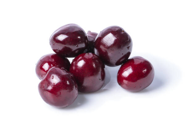 istock Sweet cherry berries isolated on white background 1169127949
