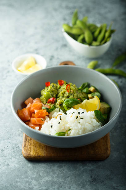 istock Rice bowl with smoked salmon 1169129407