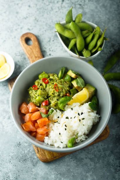 istock Rice bowl with smoked salmon 1169129488