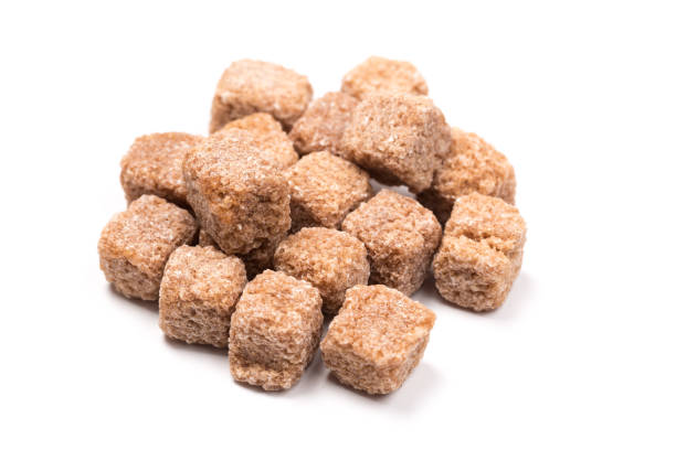 istock brown sugar isolated on white background. Top view. Flat lay 1169130770