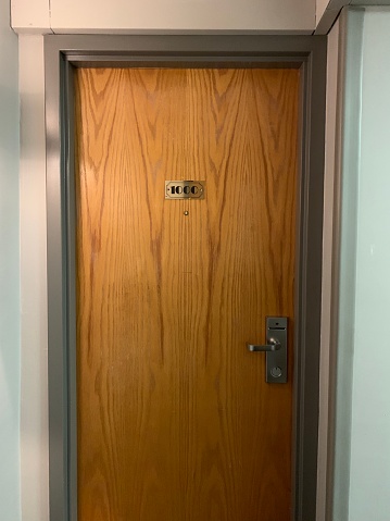 A dorm door with a room number of 1000