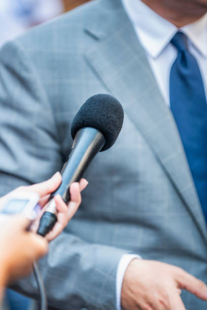 istock Media Interview. Journalists Interviewing Politician or Businessman 1169132236
