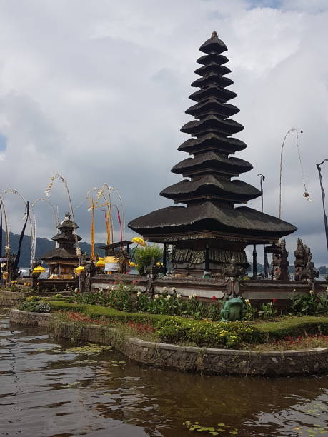 Floating temple in Bali Beautiful floating temple in Bali floating temple in lake bedugul bali stock pictures, royalty-free photos & images