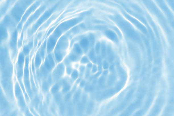 istock blue wave abstract or natural rippled water texture background 1169132318