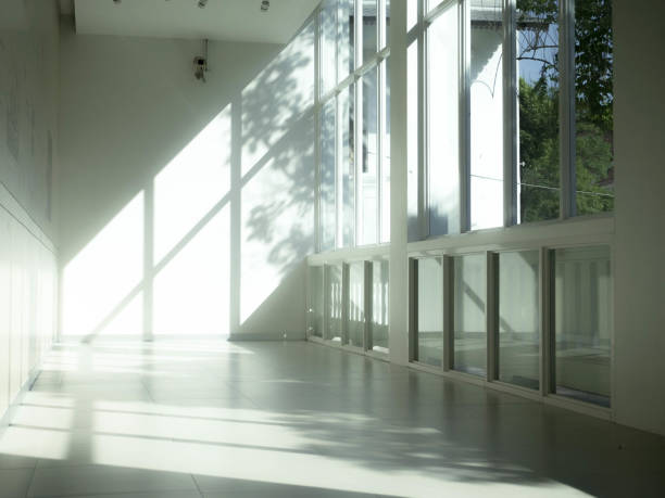 istock Industrial interior with bright light coming through windows. 1169133352