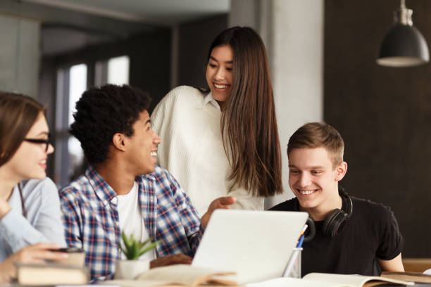 istock Education and learning concept. High school students in library 1169134266
