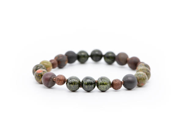 istock Bracelet from different semiprecious stones on a white background 1169134814