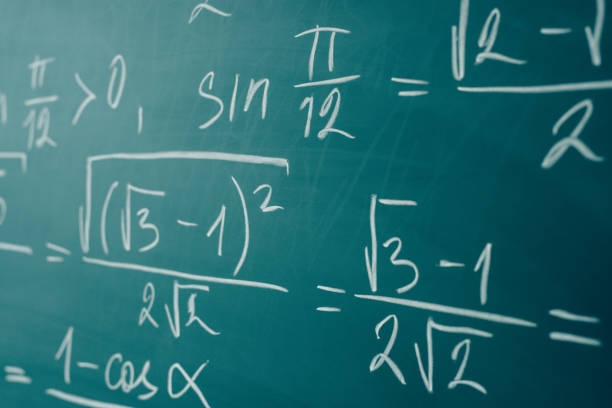 istock Maths formulas written by white chalk on the chalkboard 1169141858