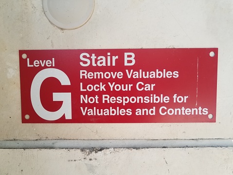 parking level G stair B remove valuables red sign on wall