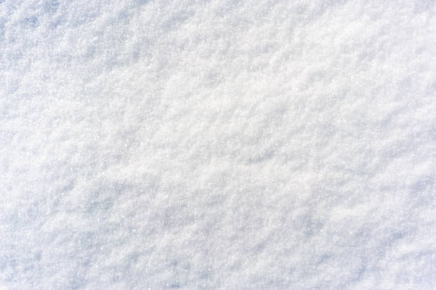 A close-up of a surface of freshly fallen December snow.