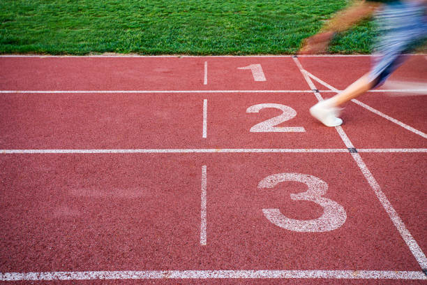 istock Athletes Crossing the Finish Line 1169145452