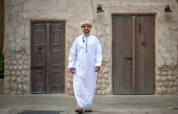 istock Arab Man walking in in Al Seef, old part of Dubai 1169145708