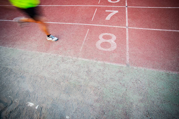 istock Athletes Crossing the Finish Line 1169145806