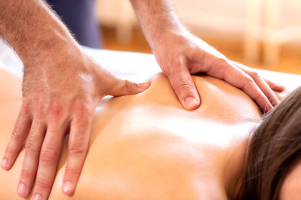istock Massage therapy in a beauty salon 1169148019