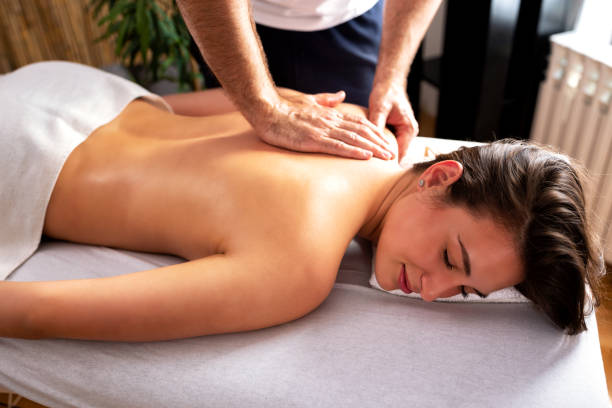 istock Upper back area massage in beauty salon 1169152509
