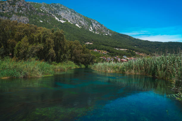 istock Akyaka Azmak River and Mountain Landscape with Blue Sky 1169155490