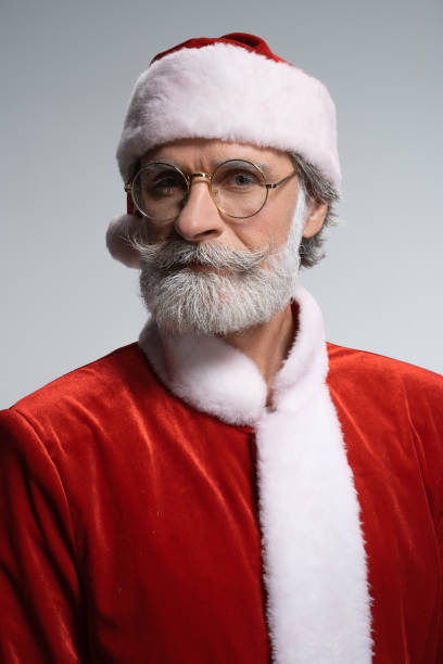 istock Santa Claus with calm face looking at camera 1169155525