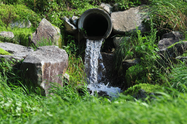 Waste water drains from concrete  pipe stock photo