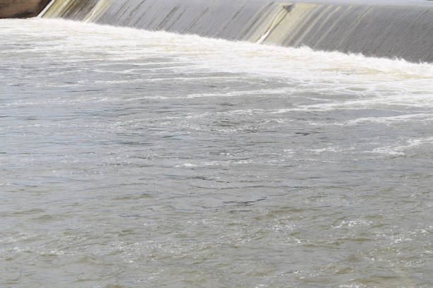 istock Dike of overflow water in day time. 1169157499