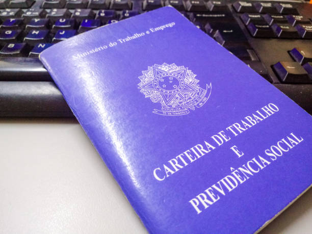 istock Brazilian document work and social security on keyboard 1169158948