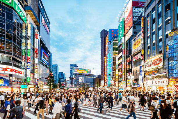 istock Commuters Crossing Zebra In Shinjuku, Tokyo 1169160271