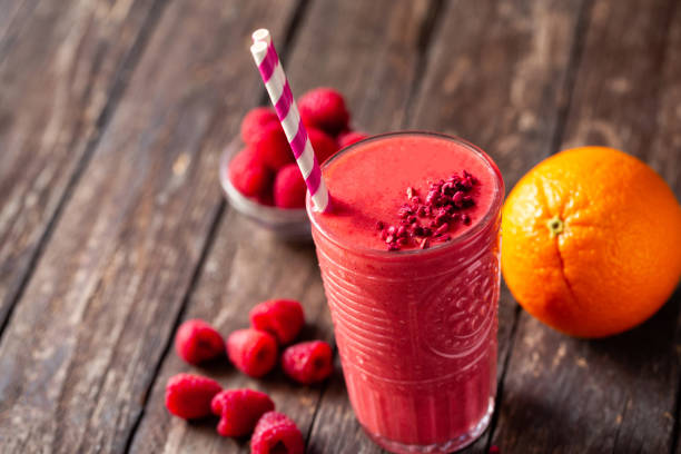 istock Hard to resist freshly blended citrus and berry fruit smoothie 1169161940
