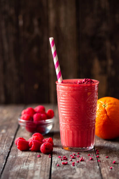 istock Hard to resist freshly blended citrus and berry fruit smoothie 1169165754