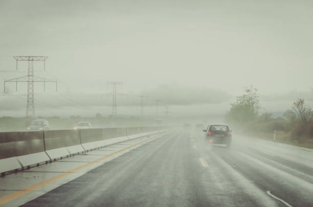 istock misty road during rainy day 1169166411
