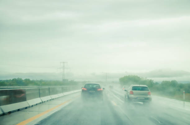 istock misty road during rainy day 1169166466