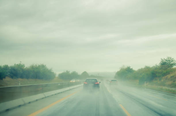 istock misty road during rainy day 1169166471
