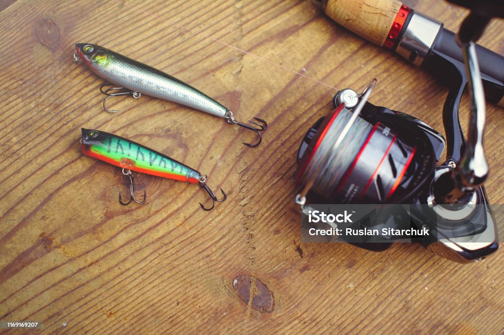Fishing Lures With Large Hooks Plastic Fishing Lures Fishing Tackle Jelly  Wobbler On A Background Of Wood With Two Hooks Photo For Typography Poster  Banner Postcard Everything For Fishing Stock Photo 